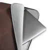 Copper Vintage Distressed Leather Laptop Sleeve — close-up of aged dark brown leather with natural creasing and copper-toned