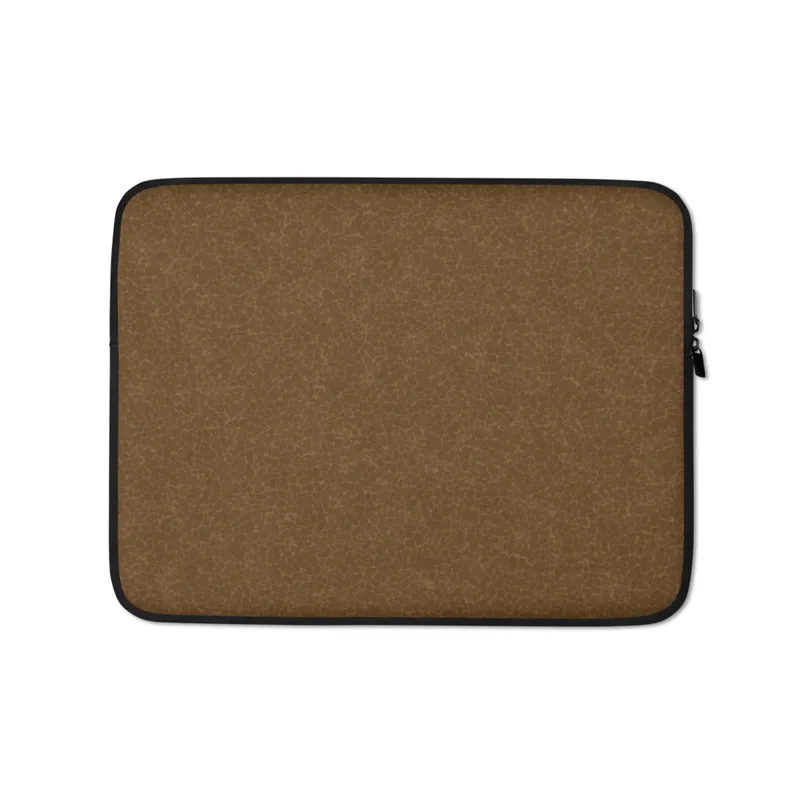 Aged Leather Terrain Laptop Sleeve — close-up crackle pattern resembling aged cognac leather with fine tonal brown fissures