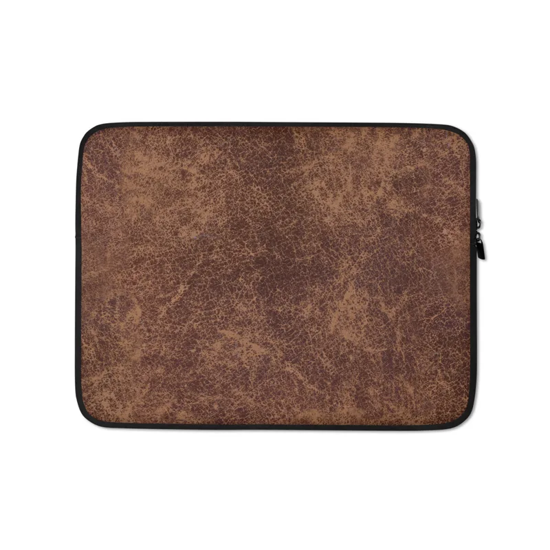 Vintage Worn Leather Laptop Sleeve — aged leather surface with cracked mahogany and warm caramel tones forming a dense web