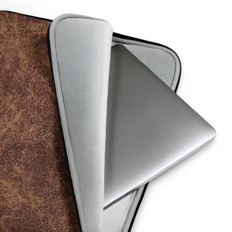 Vintage Worn Leather Laptop Sleeve — aged leather surface with cracked mahogany and warm caramel tones forming a dense web