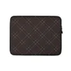 Dark Diamond Quilted Leather Laptop Sleeve — deep espresso brown quilted leather surface with a diagonal diamond grid