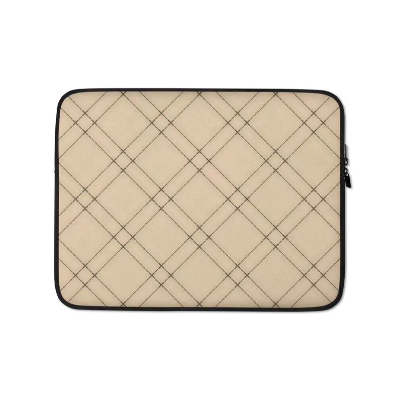 Classic Plaid Lattice Laptop Sleeve — diagonal lattice plaid pattern with fine dark lines crossing over warm sand and cream