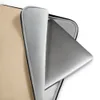 Desert Sand Minimal Laptop Sleeve — soft beige surface with subtle organic speckled texture in warm sand and cream tones, no
