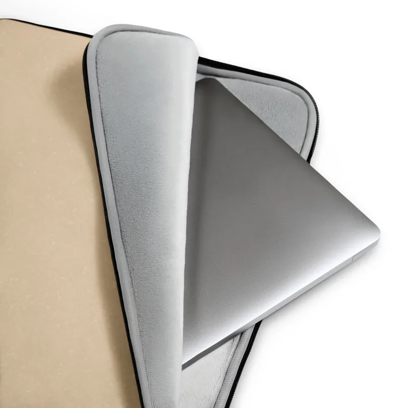 Desert Sand Minimal Laptop Sleeve — soft beige surface with subtle organic speckled texture in warm sand and cream tones, no