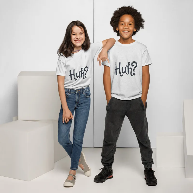 Ash Huh? Say That Again, front view — bold hand-lettered word Huh followed by a question mark in dark navy blue on a warm