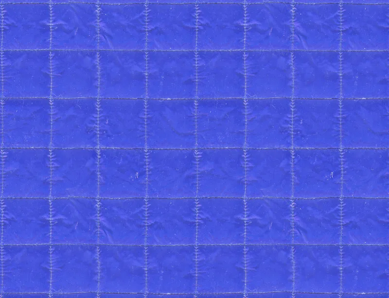 Royal Blue Quilted Grid Laptop Sleeve design — quilted rectangular grid pattern in deep royal blue with stitched lines
