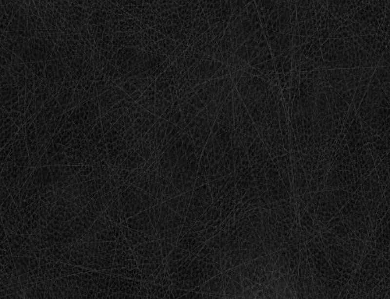 Midnight Black Leather Laptop Sleeve design — close-up black leather surface with fine cracked lines and pebbled grain