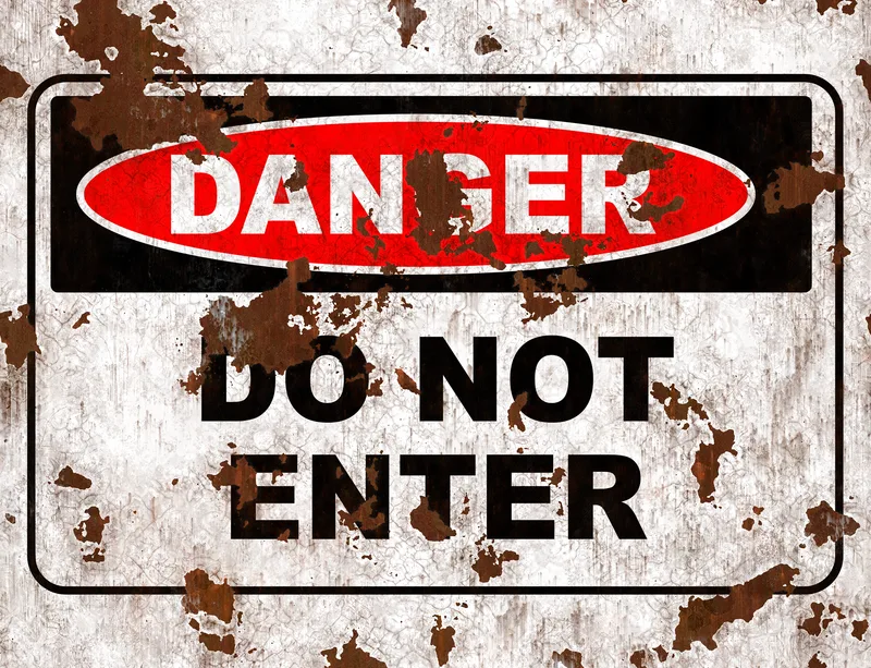 Danger Do Not Enter Laptop Sleeve design — weathered metal sign with red oval DANGER badge and bold black DO NOT ENTER text